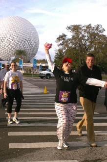 Aurora De Lucia making a big silly face and gesture at the Disney Tangled 5k 2012