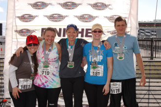 Aurora with her new friends in the finisher area at the North Carolina half marathon 2012