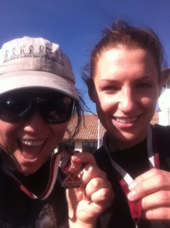 close up of Aurora and Erin smiling and holding their medals after the Boney Mountain 6k 2012