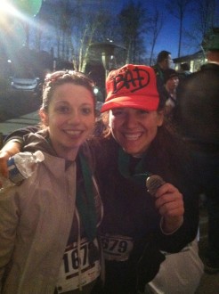 Aurora and her friend Jaime posing with their medals at the end of the Kinsale St. Patrick's Day 4-mile race