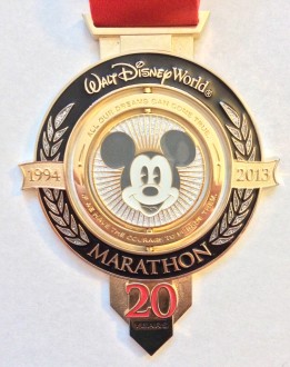 Marathon medal from 20th anniversary of the Walt Disney World Marathon (2013) - It says "all our dreams can come true, if we have the courage to pursue them"