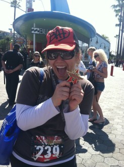 Aurora De Lucia posing with her medal at the Hollywood Half Marathon 2012