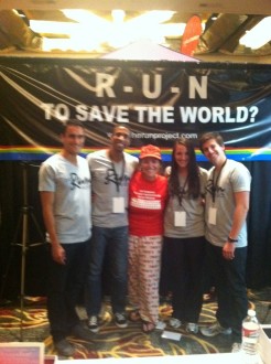 Aurora posing with members of the Run Project team at the Hollywood Half Marathon expo 2012