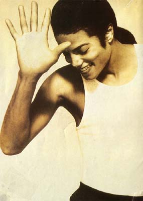 Michael Jackson with the sexy looking down, hand sort of in front of face pose from the In The Closet video