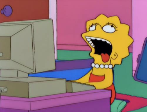 Lisa Simpson, frustrated, sitting at her computer with her head back, mouth agape, and tongue sticking out