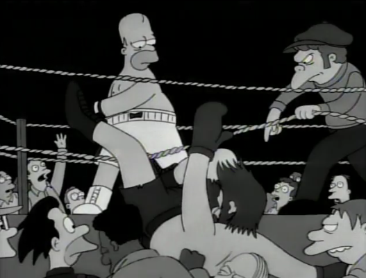 Homer Simpson in a boxing match in black and white with Moe as his coach
