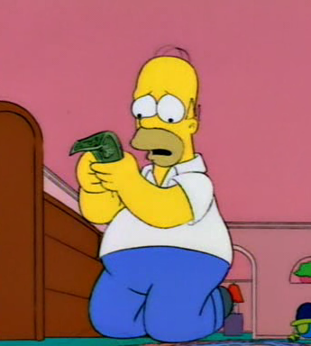 Homer Simpson kneeling holding a small amount of money with a sad look