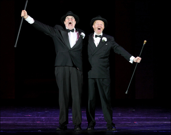 Richard Kind and Jesse Tyler Ferguson with canes and hats doing the finale in The Producers at the Hollywood Bowl
