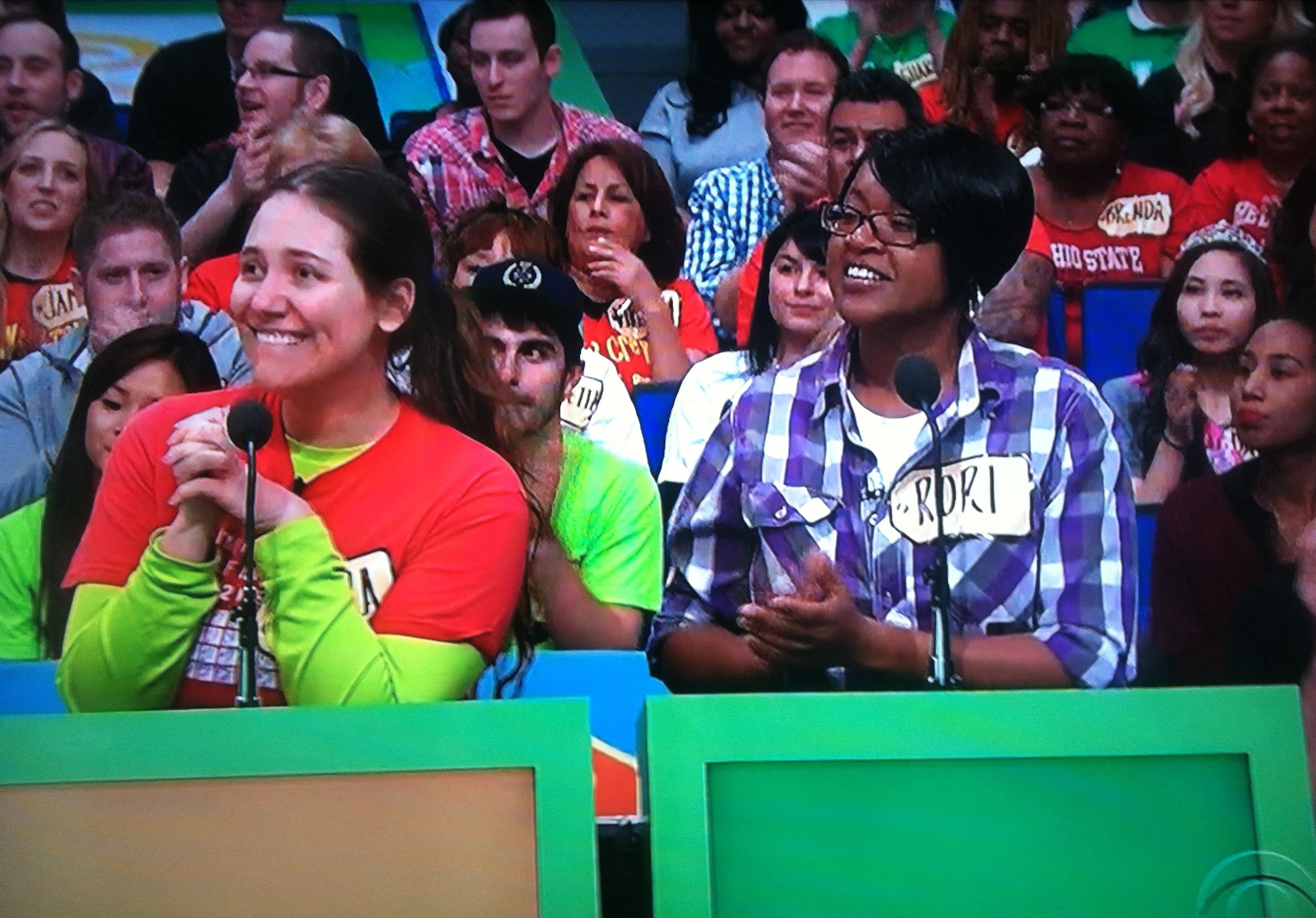 Aurora De Lucia in contestant's row on The Price is Right, looking like she really wants those camcorders