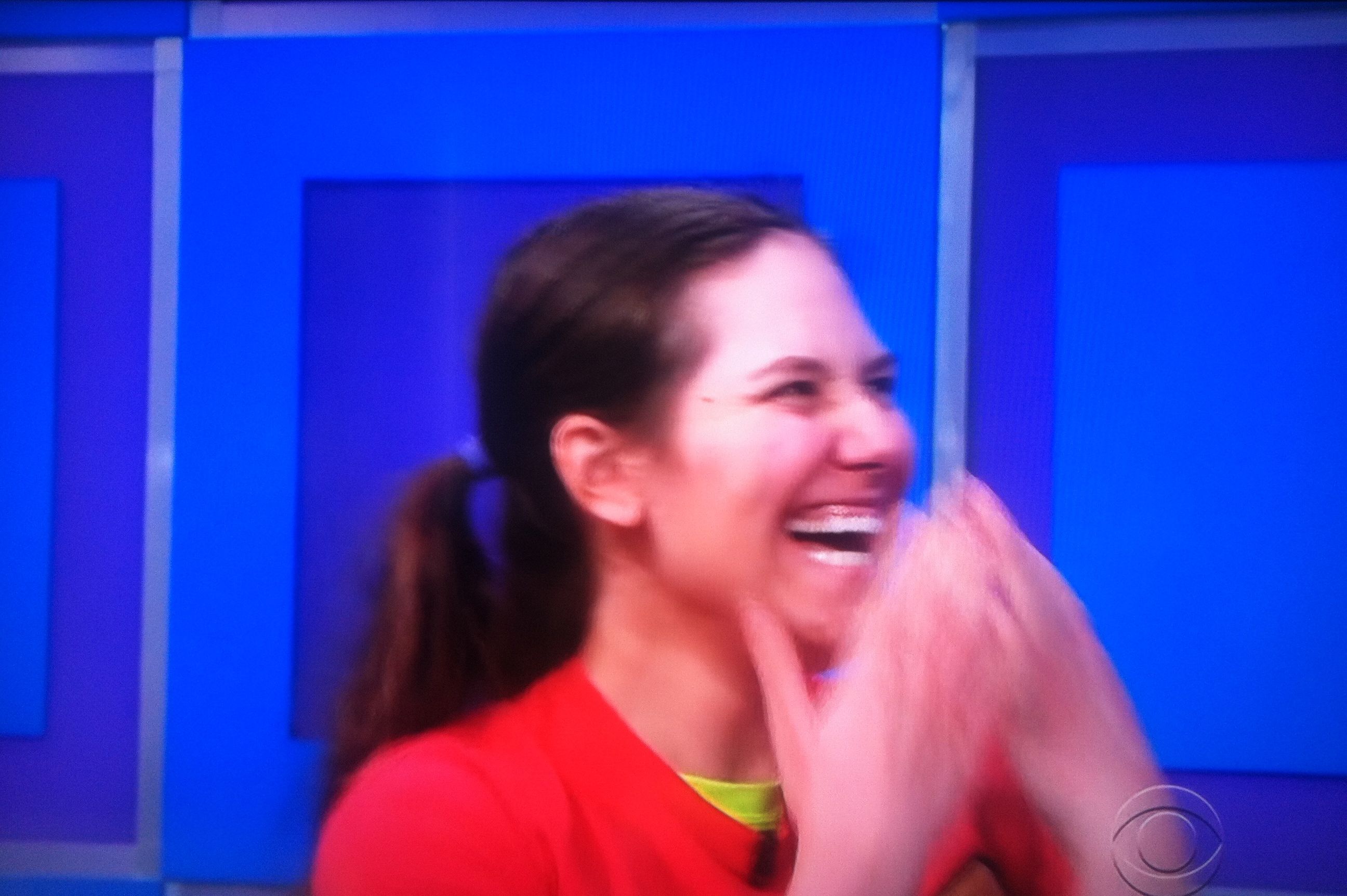 Aurora De Lucia laughing at something Drew Carey said on The Price is Right stage