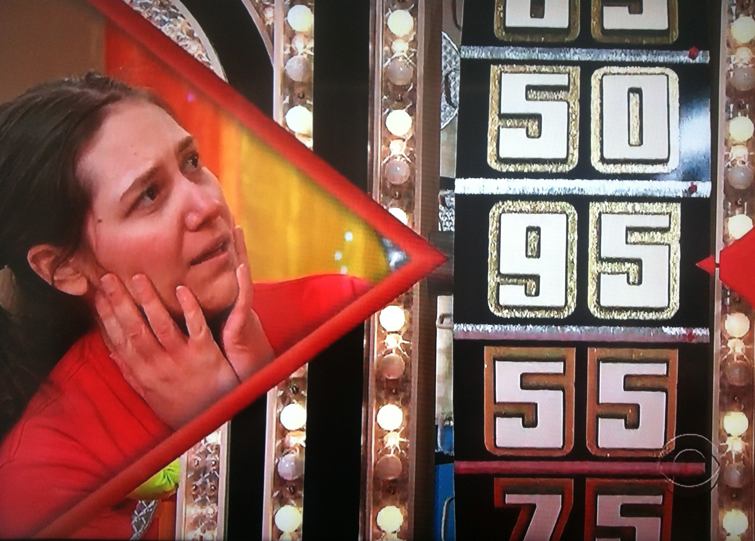 Aurora stressed as she's about to go over a dollar on The Price is Right wheel
