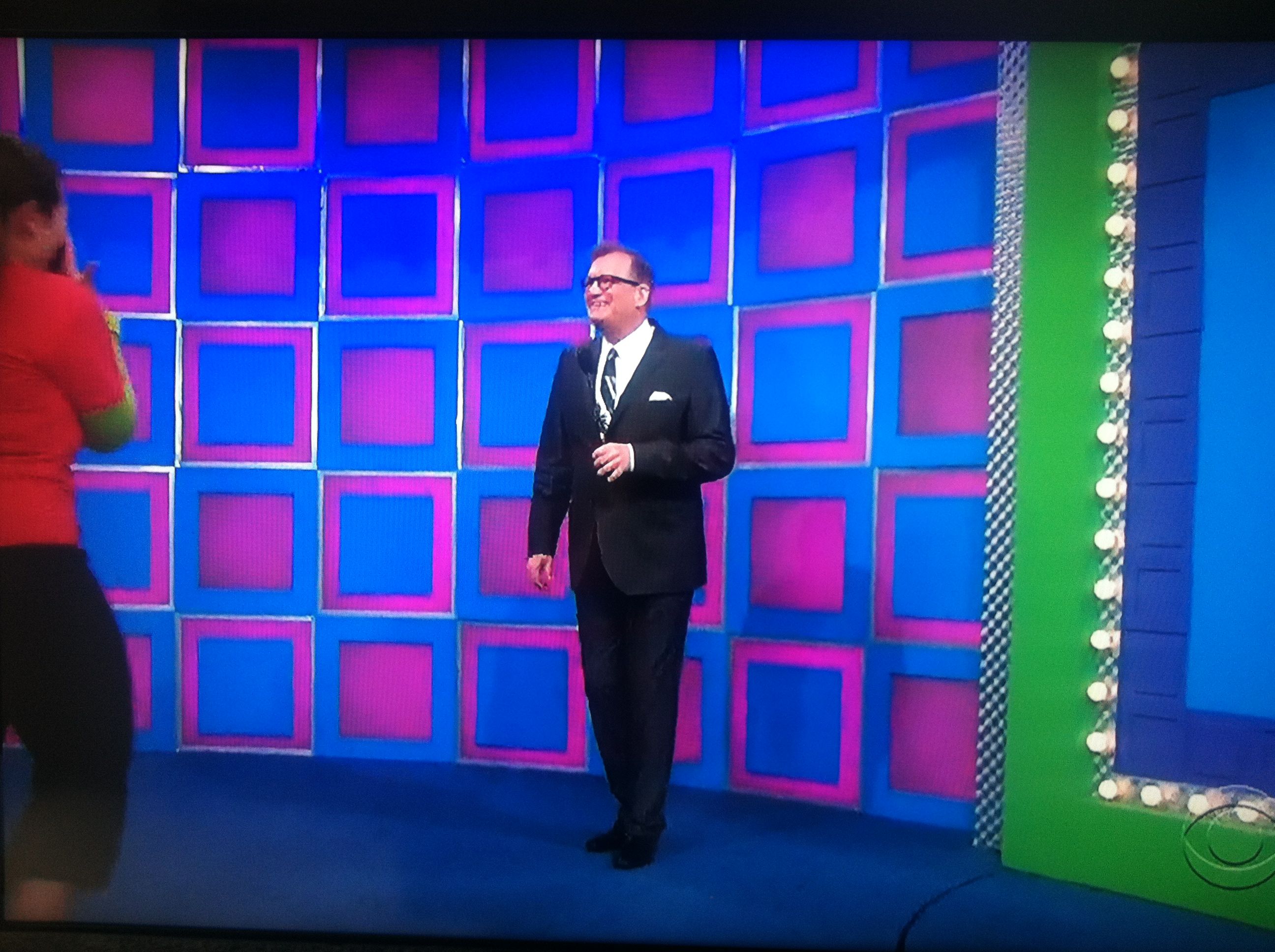 Aurora De Lucia being welcomed to The Price is Right stage by Drew Carey