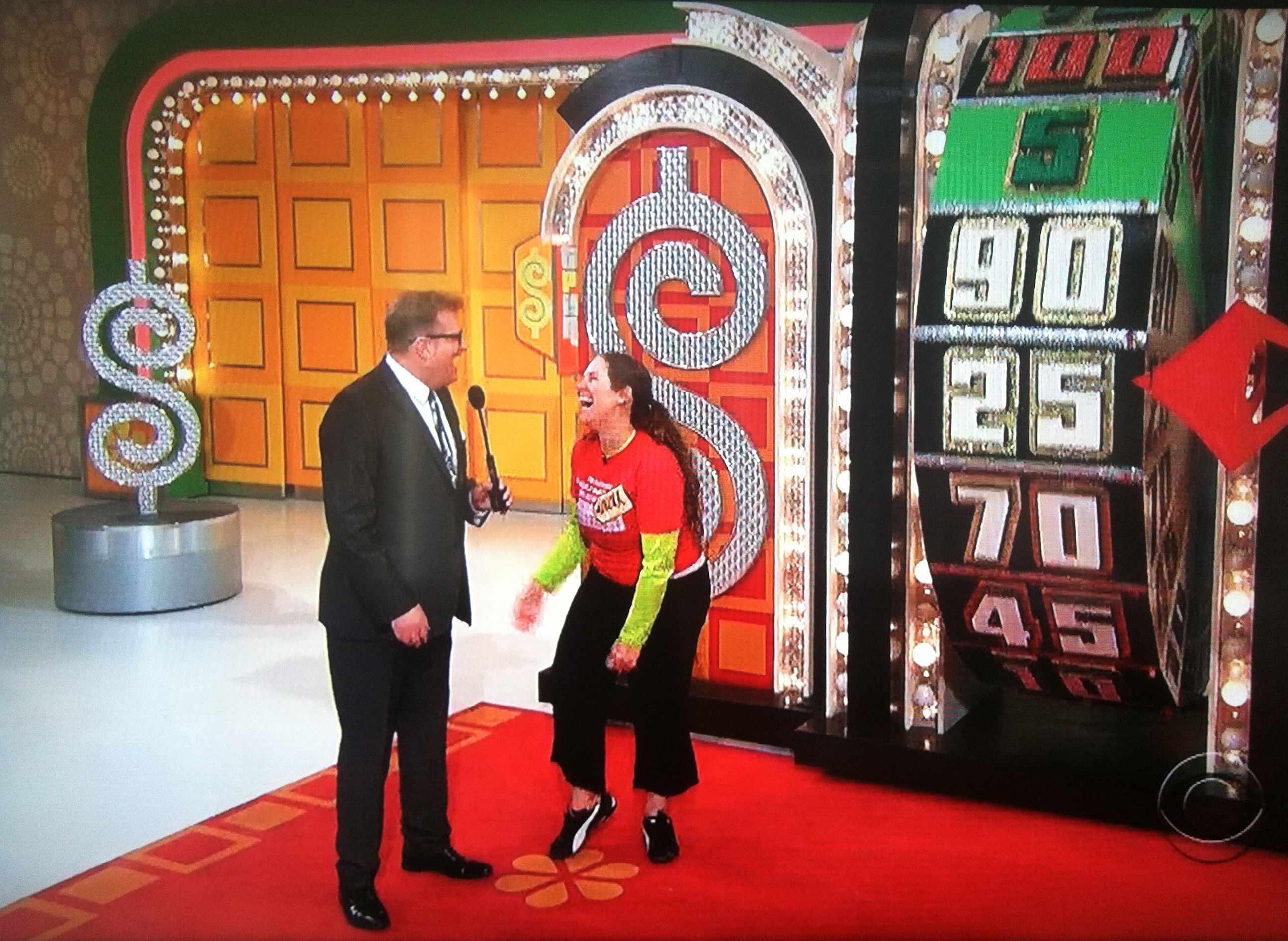 Aurora De Lucia laughing it up with Drew Carey at the wheel on The Price is Right