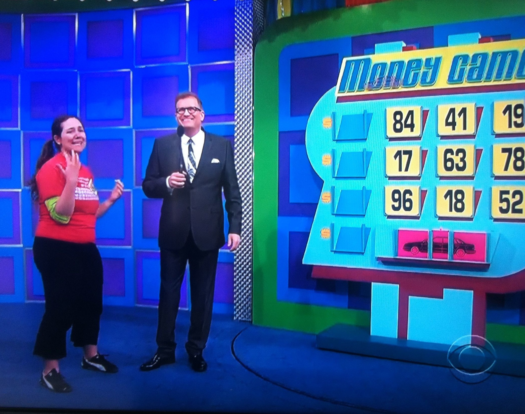 Aurora De Lucia standing by Drew Carey as she's nervous to play The Money Game on The Price is Right