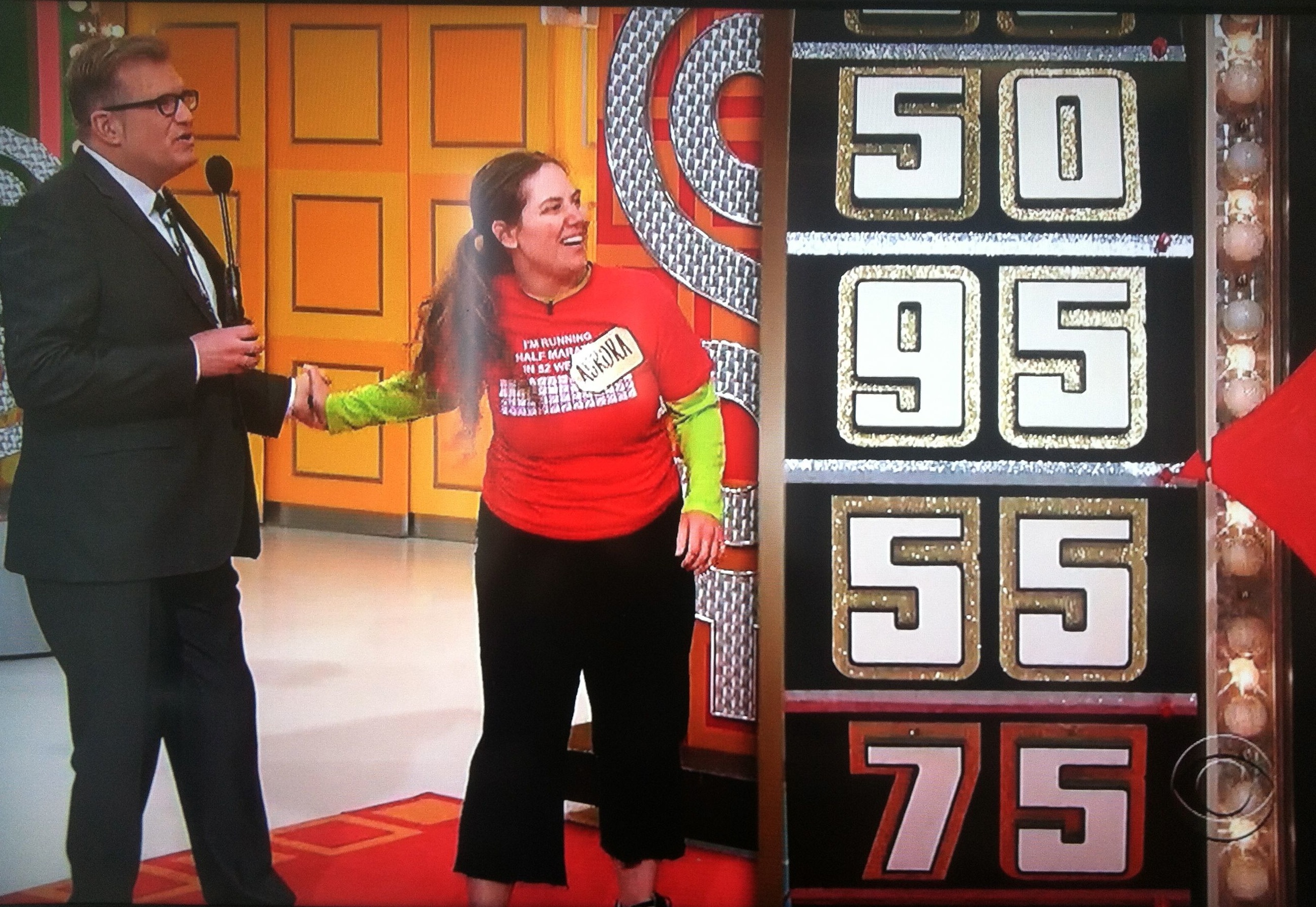 Drew Carey and Aurora seeing that the wheel had almost landed on 95 on The Price is Right