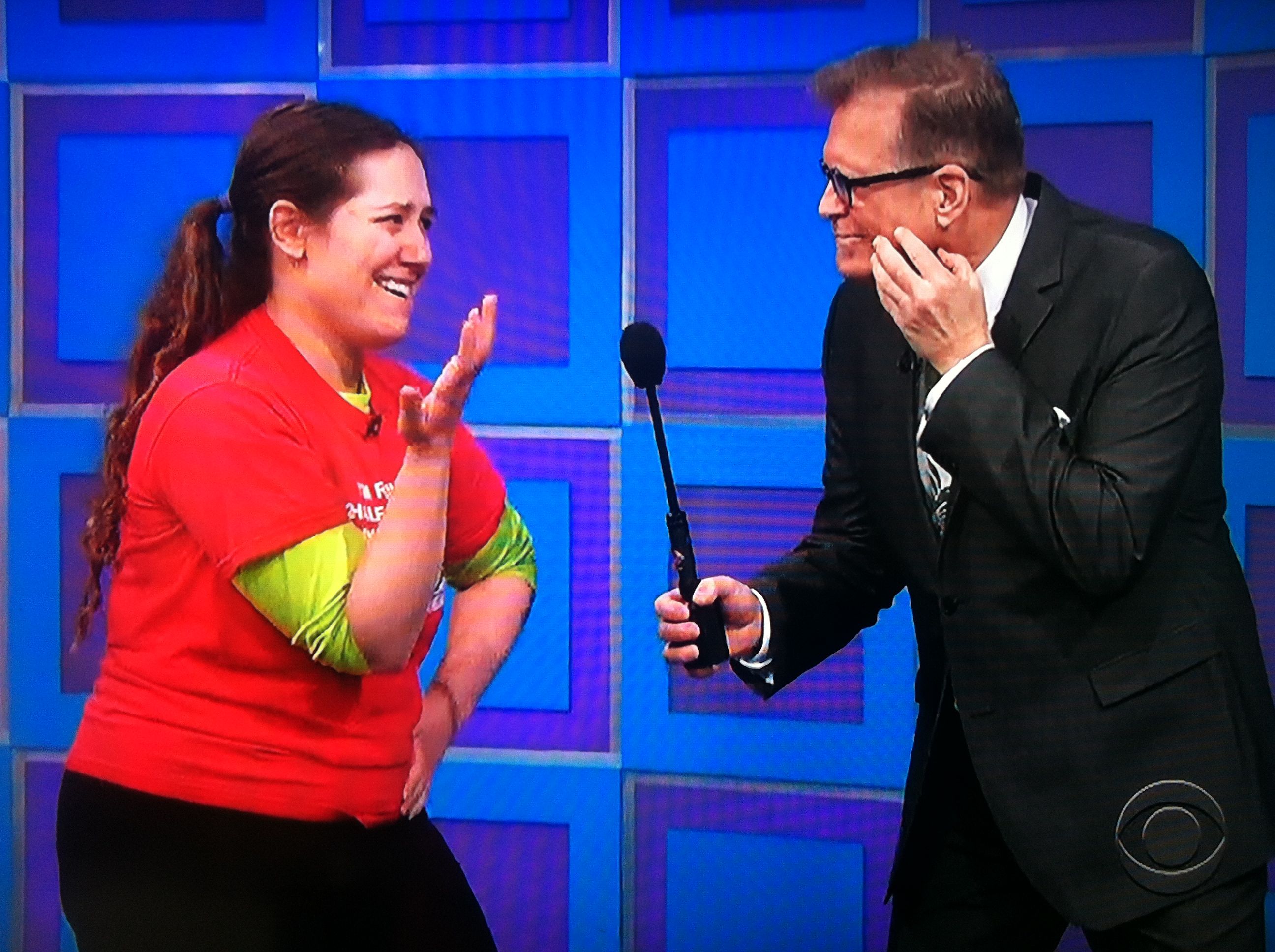 Aurora De Lucia and Drew Carey with their thinking faces on at The Price is Right