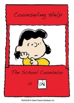 Lucy the Peanuts character sitting at her counseling help booth