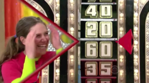 Aurora De Lucia smiling at the wheel on Price is Right