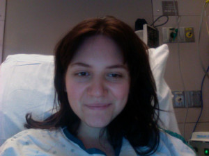 Aurora De Lucia selfie in a hospital bed