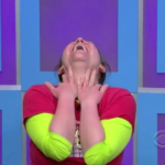Aurora on the ground at Price is Right with her head lifted up