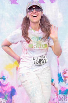 Aurora with a huge smile posing after Color Me Rad