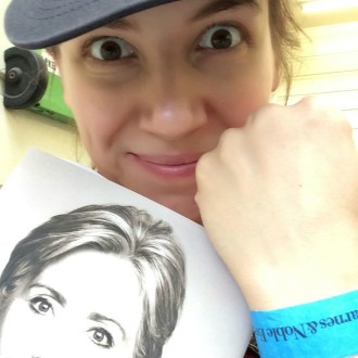 Aurora posing with Hillary Clinton wristband and book before a book signing at The Grove