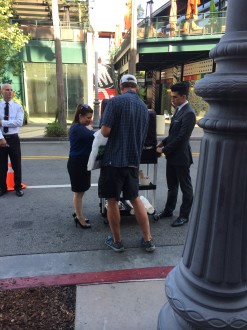 staff from The Grove handing out coffee to people at Hillary Clinton's book signing (June 19, 2014)