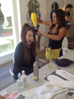Aurora De Lucia at Blushington getting make-up done before the Creative Arts Emmys with a very excited face
