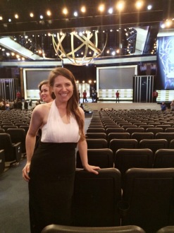 Aurora posing with stage in background at Creative Arts Emmys 2014
