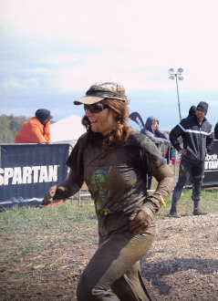 Aurora De Lucia covered in mud finishing the Spartan Beast Ohio 2014