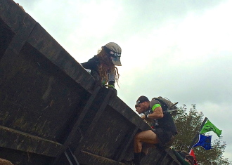Aurora De Lucia climbing over a wall at the Spartan trifecta-in-a-day Ohio 2014