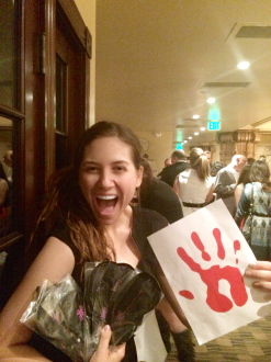Aurora excited with her red hand sign and blindfolds at The Joshua Project Foundation Dining in the Dark 2014