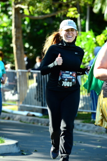 Aurora De Lucia smiling while running the Avenger's Half Marathon 2014