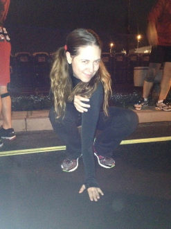 Aurora De Lucia stretching in her corral before the inaugural Disney's Avenger's Half Marathon 2014
