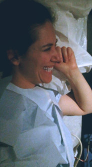 Aurora De Lucia smiling as she watches her echocardiogram