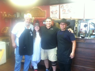 Aurora, her dad, and their two new friends at Tub's Chili in Culver City