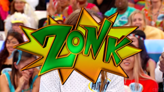 Big zonk graphic over Aurora's face on Let's Make a Deal