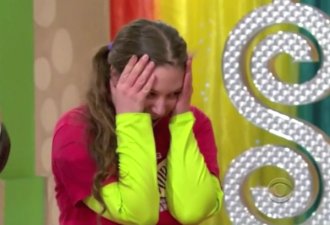 Aurora holding her head in her hands on The Price is Right