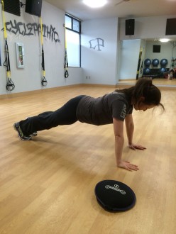 Aurora doing a plank at Cyclepathic