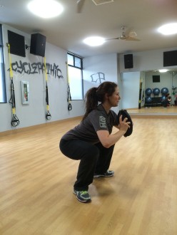 Aurora doing a squat at Cyclepathic