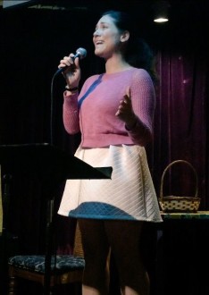 Aurora standing on her toes at poetry