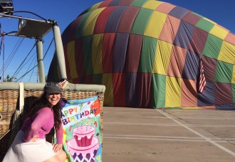 Aurora with the Happy Birthday sign hot air ballooning