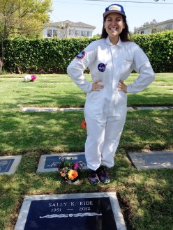 Aurora as Sally Ride (in astronaut suit) at Sally Ride's gravesite