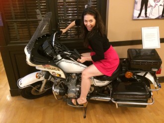 Aurora De Lucia on a motorcycle at the Los Angeles Police Museum