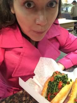 Aurora with her vegan sandwich at Reading Terminal Market