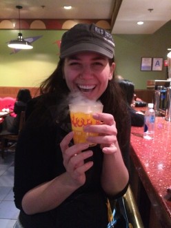 Aurora De Lucia holding her Flaming Moe's drink