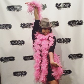 Aurora posing at Flappers step and repeat