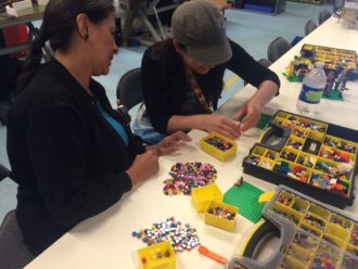 Aurora building her Lego person
